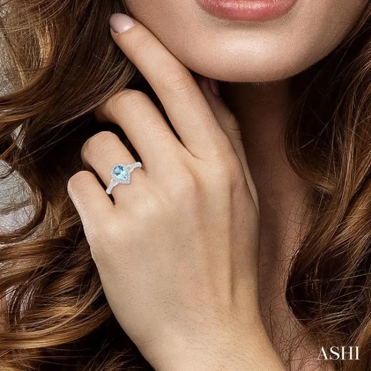 7x5 MM Pear Shape Aquamarine and 1/6 ctw Round Cut Diamond Ring in 10K White Gold