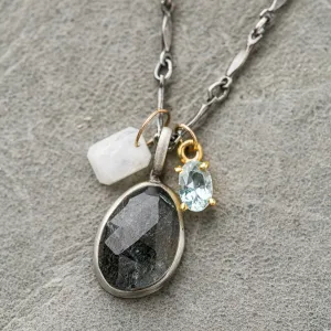 Moss aquamarine necklace with moonstone and topaz charms